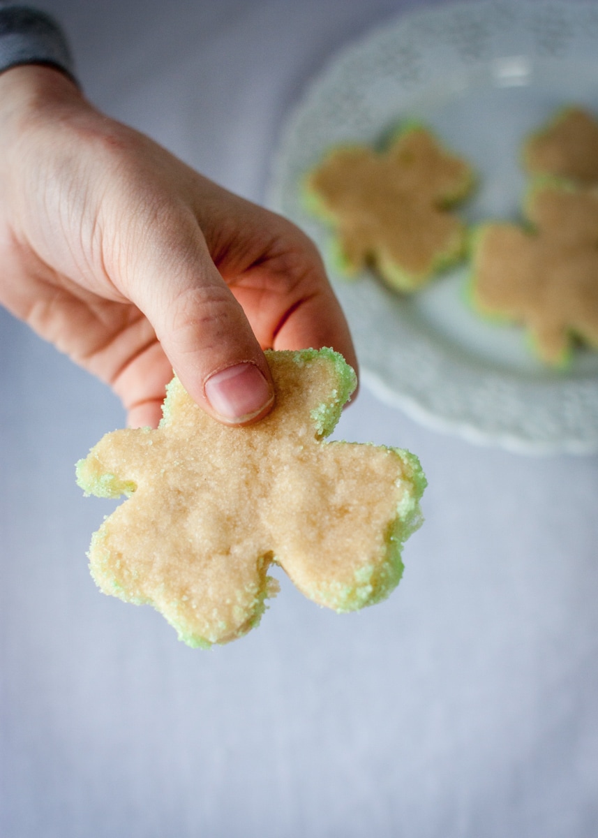 Shamrock shaped sugar cookie with green sparkling sugar