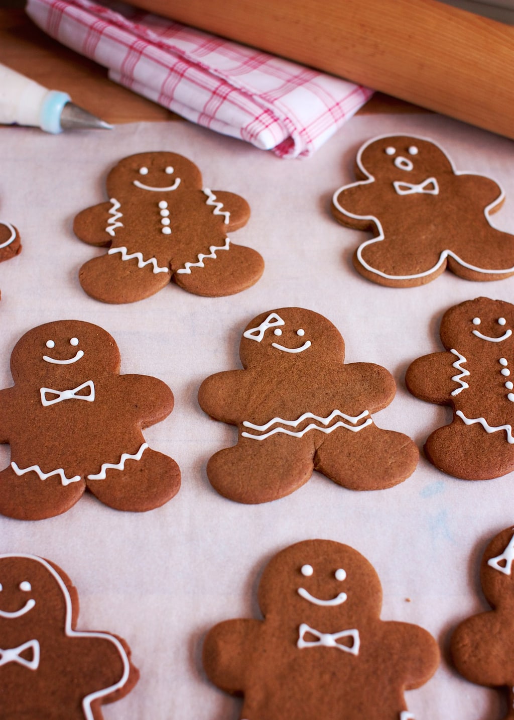 Gingerbread men cookies on a countertop.